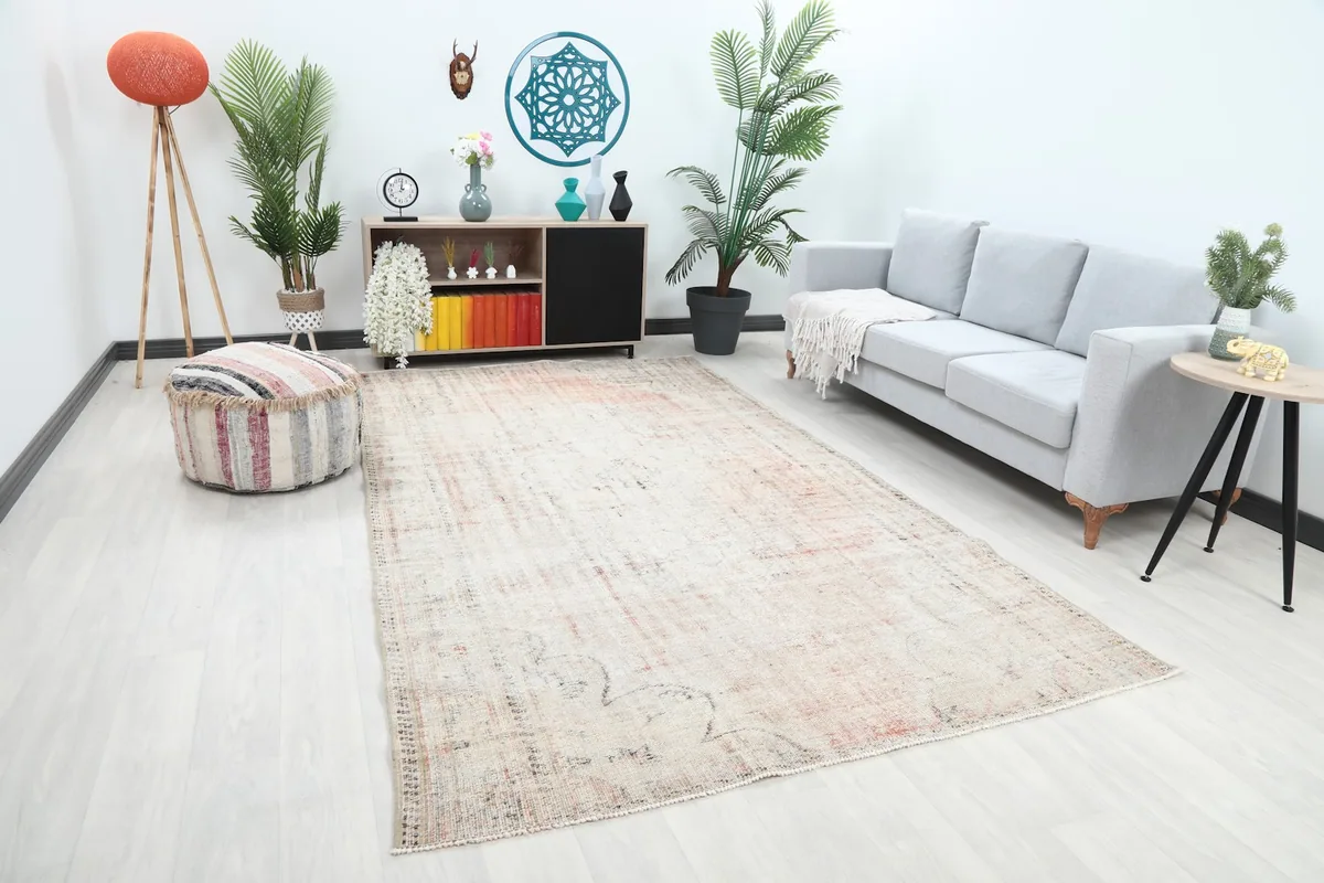 Angle view of the large vintage Anatolian rug complementing a modern living space.