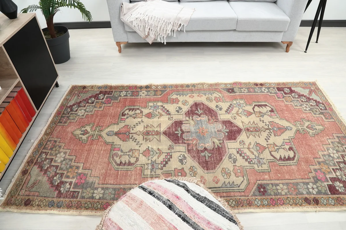 Wide shot of the rug in a room, showing its full length and how it complements furniture