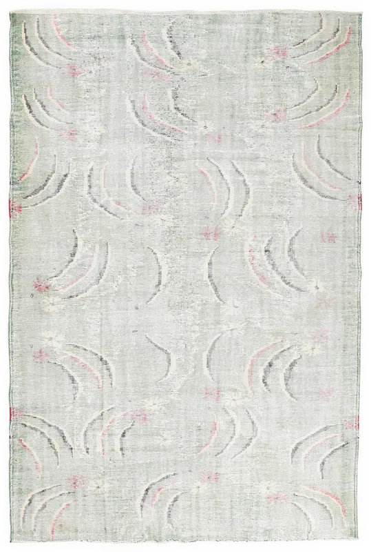 Full overhead view of the 6'3" x 9'5" faded green abstract vintage Anatolian rug on a white background.