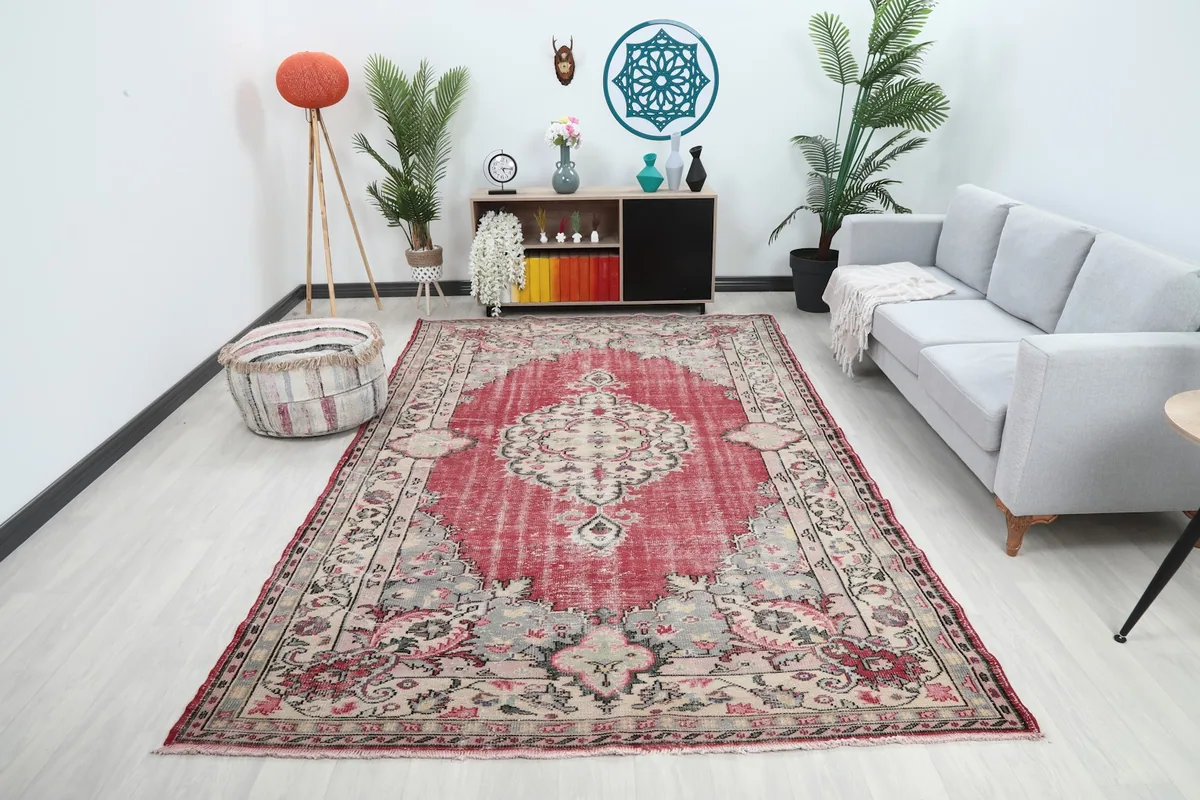 Vintage Anatolian area rug in a modern living room setting, showcasing its scale and colors