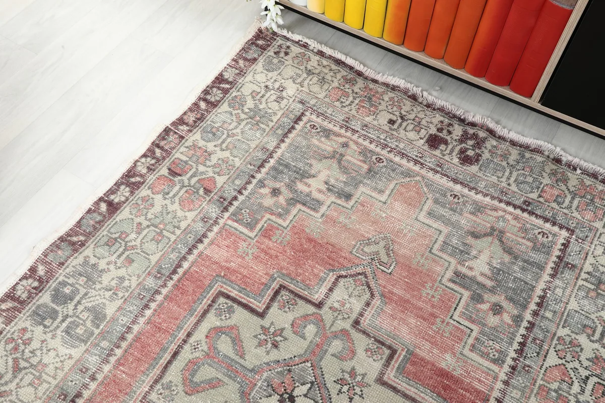 View of the rug's surface texture and colors from an elevated angle