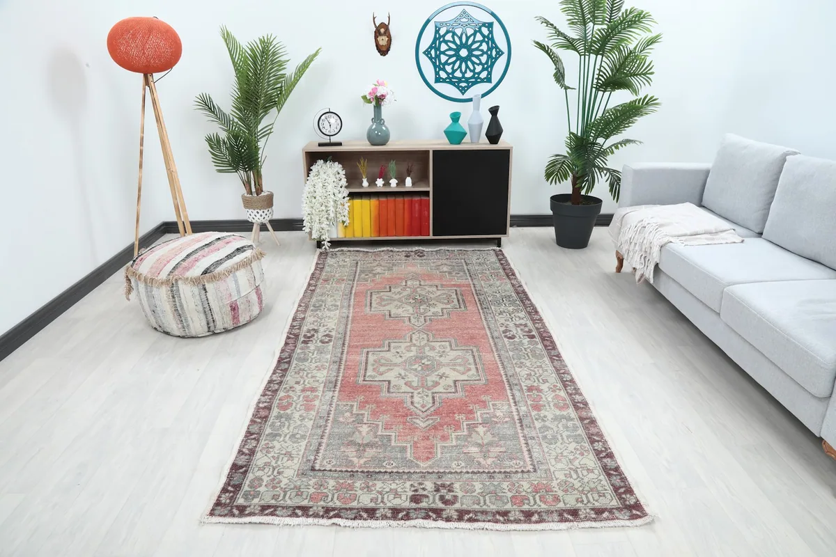 Vintage rose and gray rug in a modern living room setting