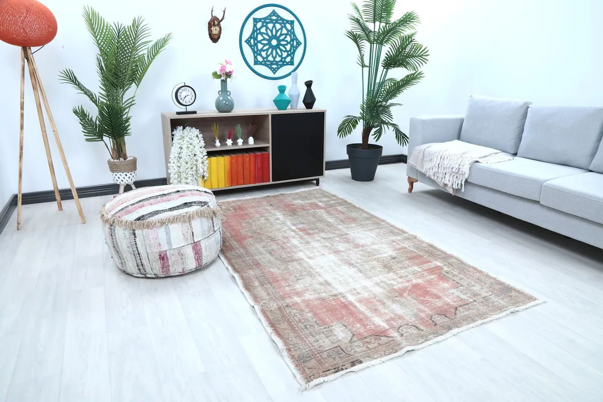 Overhead view of the rug in a living room, showing its placement relative to furniture