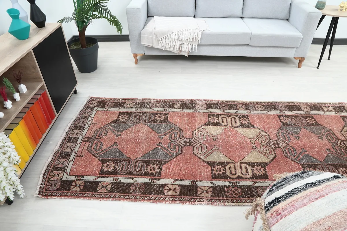 Room view showing the full length of the vintage rose runner rug in an interior space
