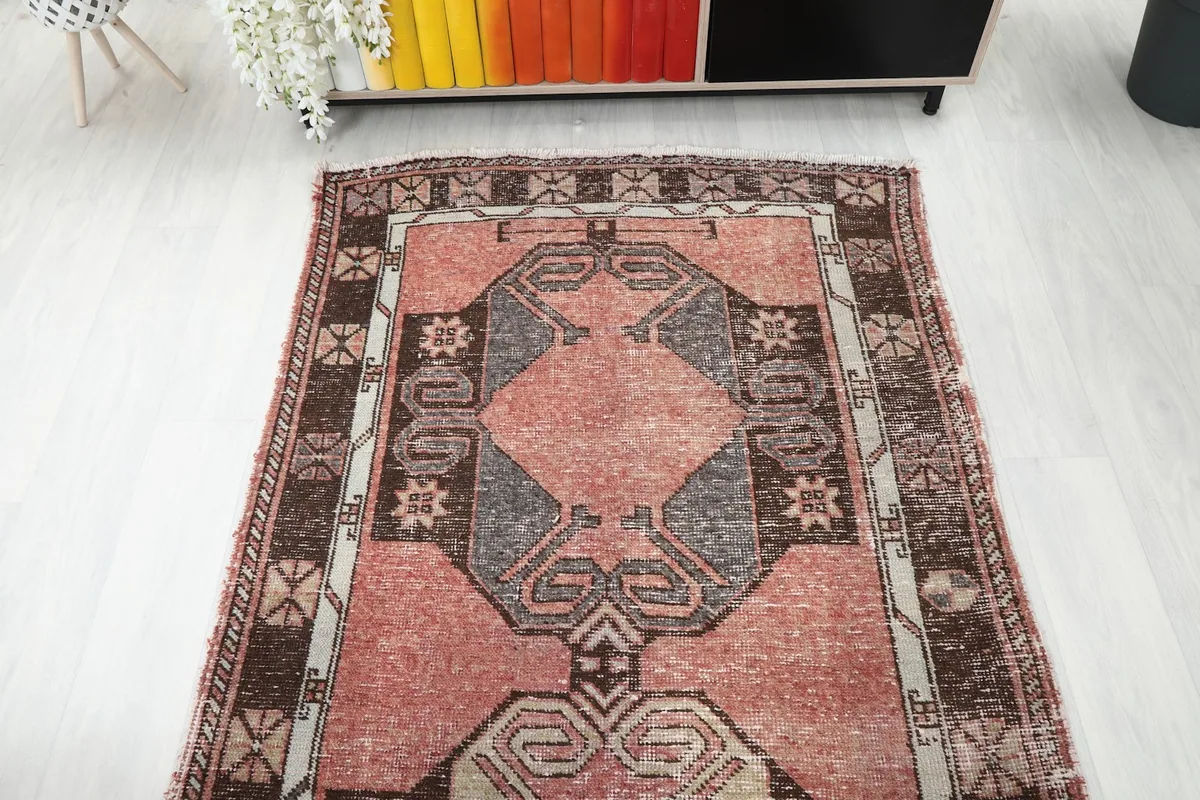 Overhead view of a section of the rose runner rug, emphasizing its overall pattern