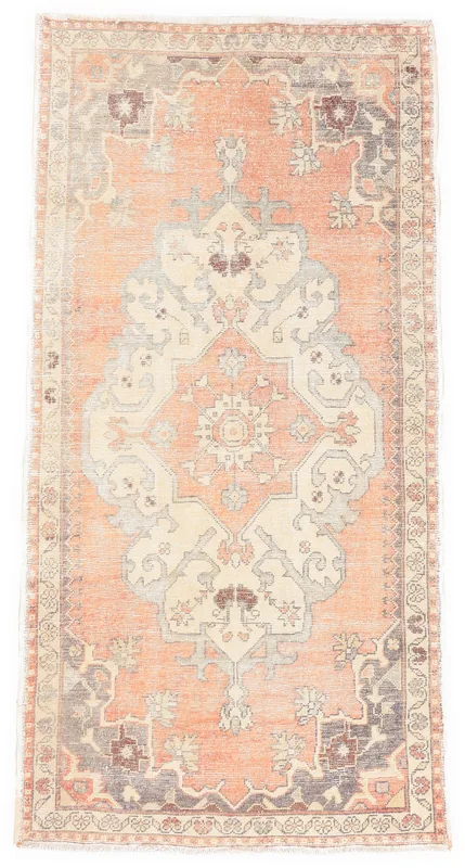 Full overhead view of the rust and ivory vintage Anatolian rug