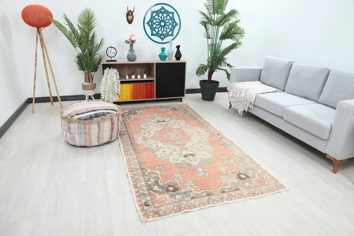 Angle view of the rust and ivory rug complementing a contemporary living space