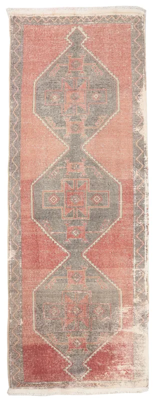 Full top view of the 4'1" x 11'3" vintage Anatolian runner with rose and charcoal geometric patterns.