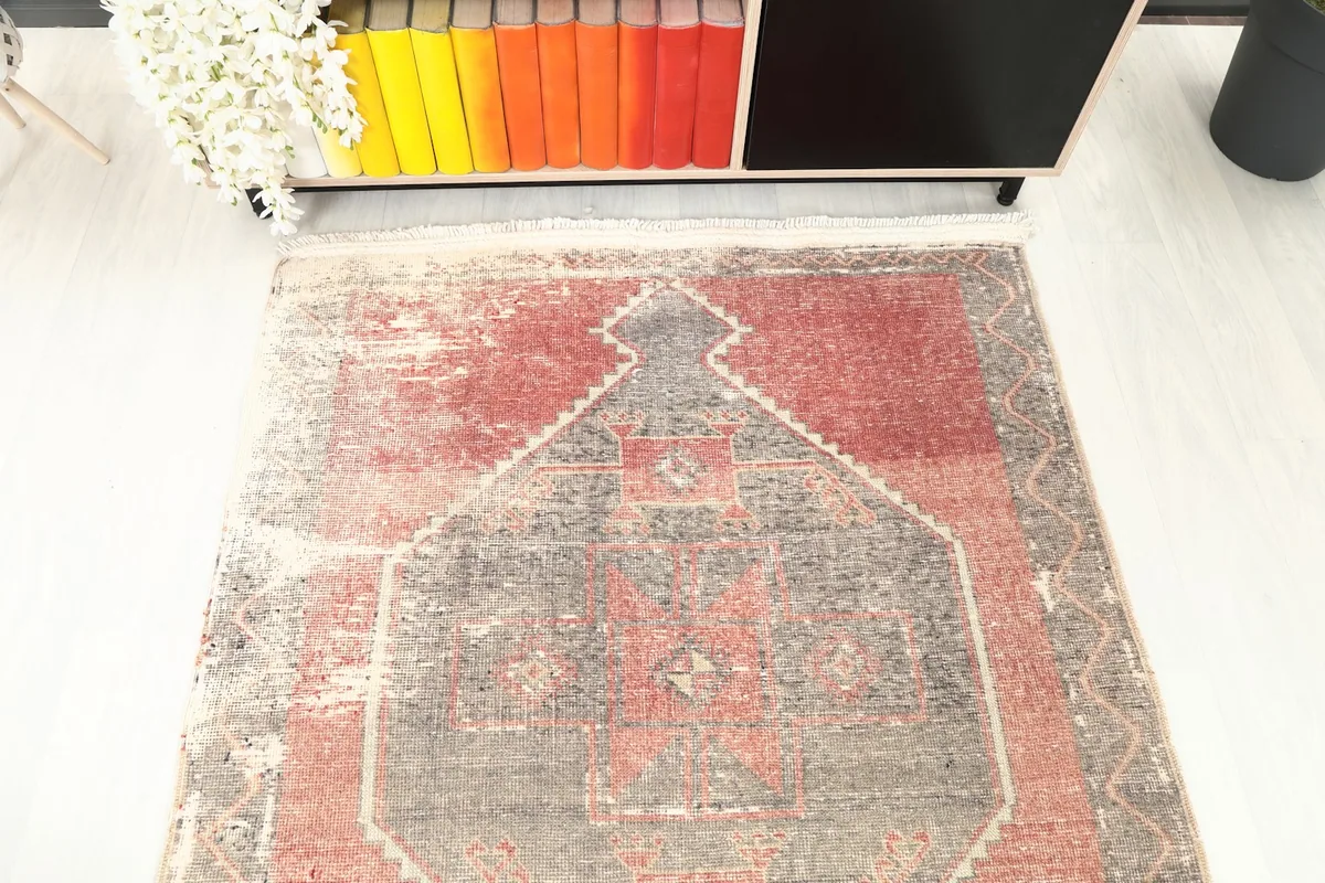 Overhead view focusing on one end of the runner, displaying the large geometric design.