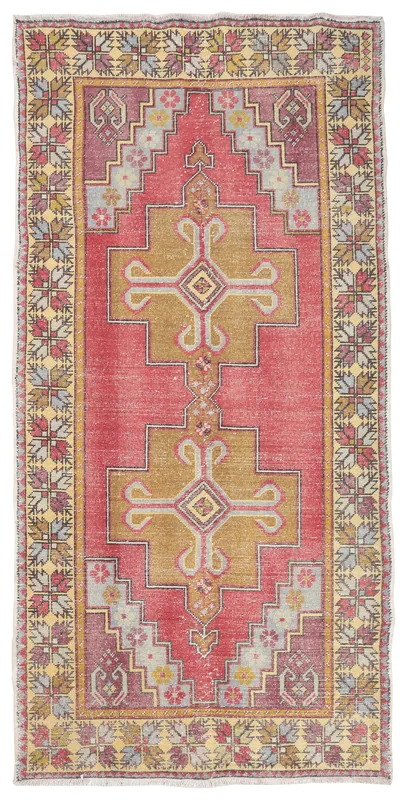 Full top view of the vintage Anatolian area rug with rose field and gold geometric motifs