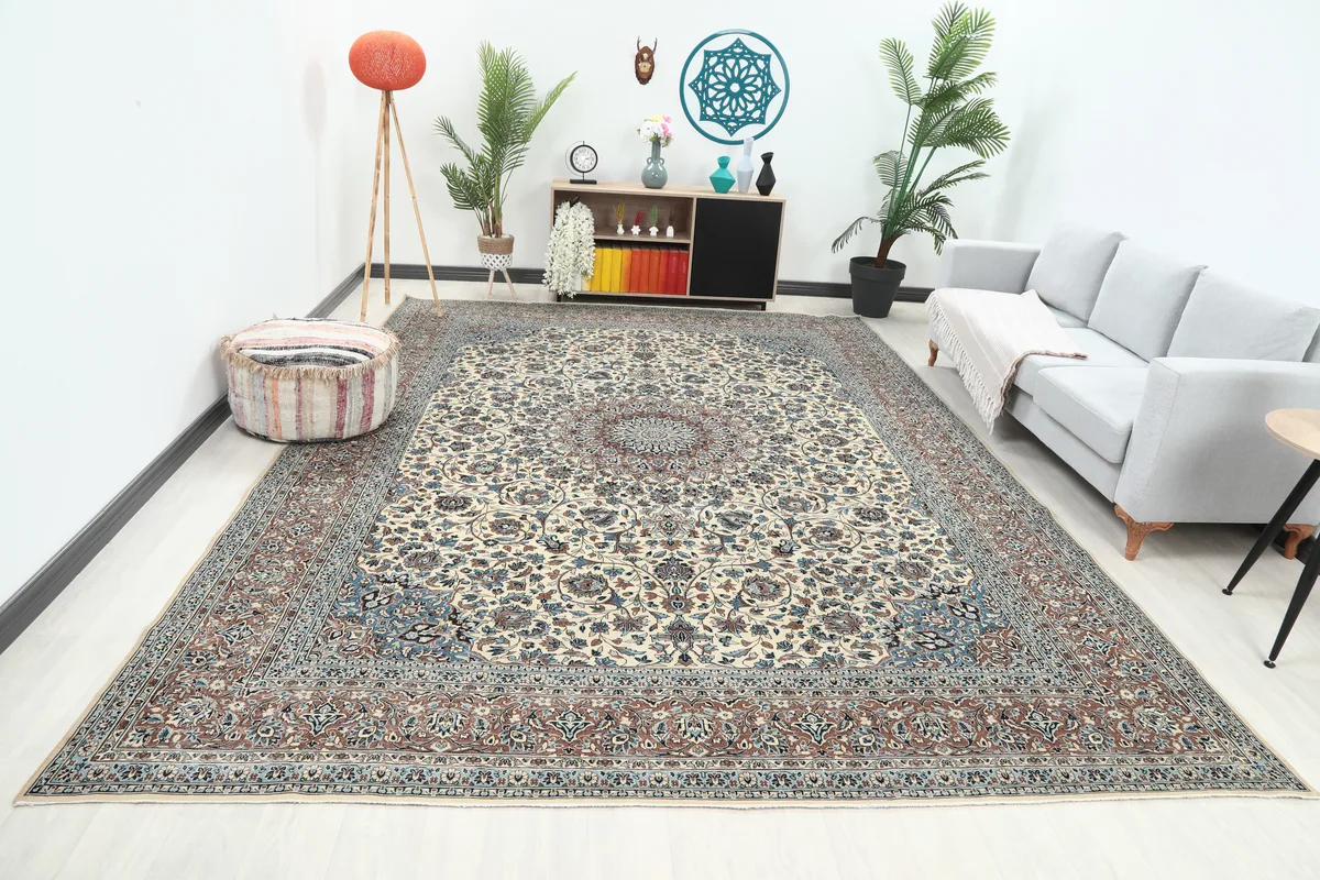 Ivory Floral Medallion Anatolian Rug in a living room setting from an angle