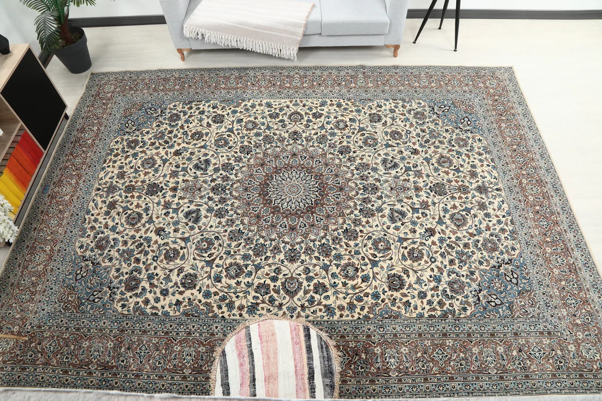 Overhead room view of the Ivory Floral Medallion Anatolian Rug, centered in a living space