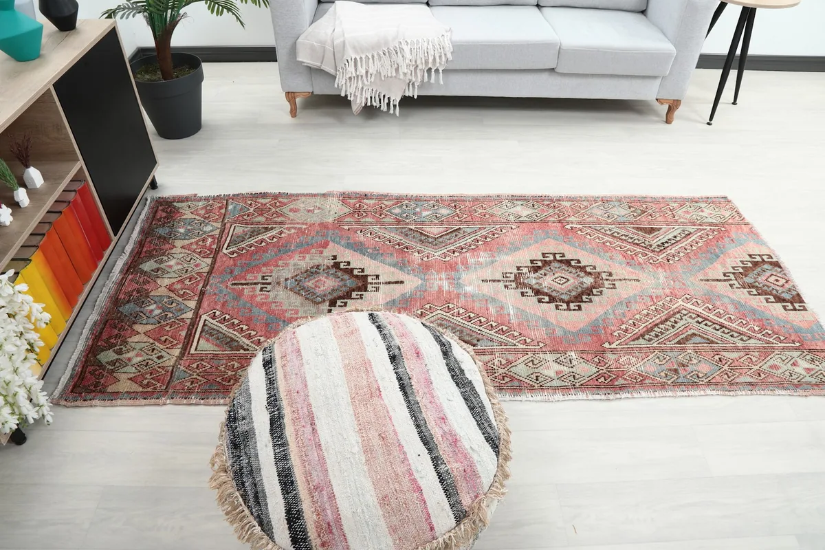 Full room view with the rose and blue runner complementing the home decor
