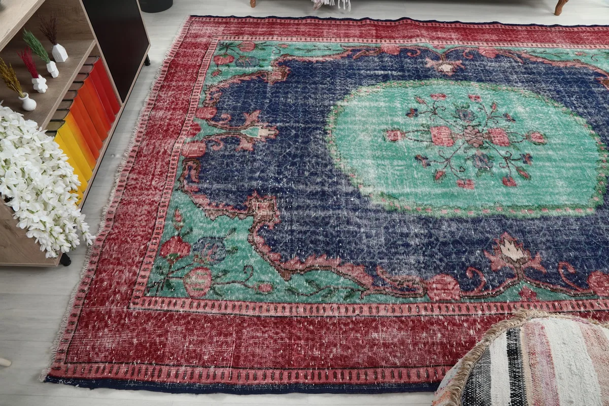 Wide angled shot of the vintage rug, showing its size in a room