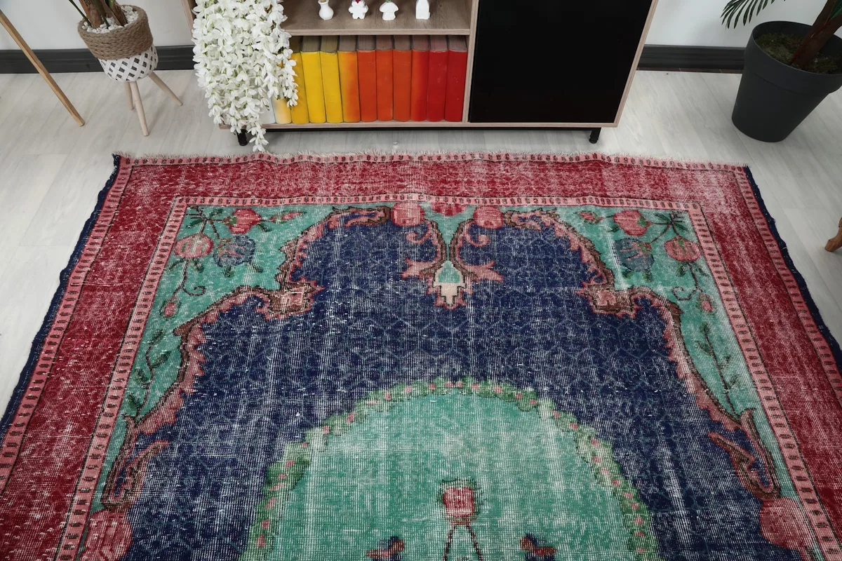 Overhead view of the rug's top half, showcasing the medallion and border