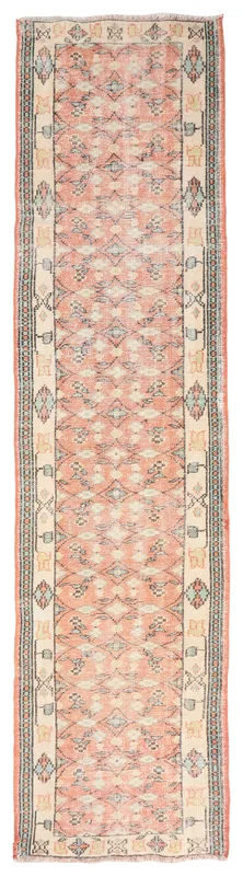 Full top view of the 2'9" x 11'3" vintage rose geometric runner rug on a white background.