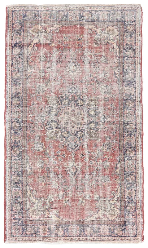 Full top view of the 3'8" x 6'5" vintage Anatolian area rug with red field and navy border