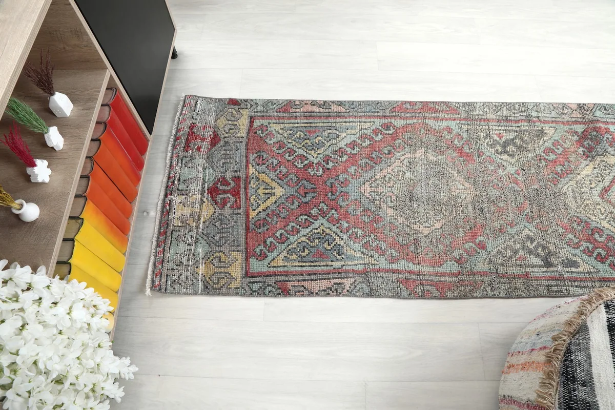 Side angle view of the runner rug, capturing its length and how it lays on the floor