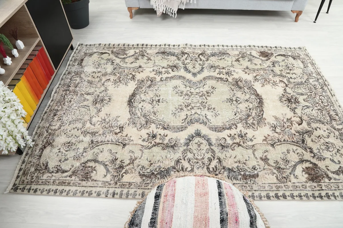 Wide overhead view of the rug in a room, showing its full size and context
