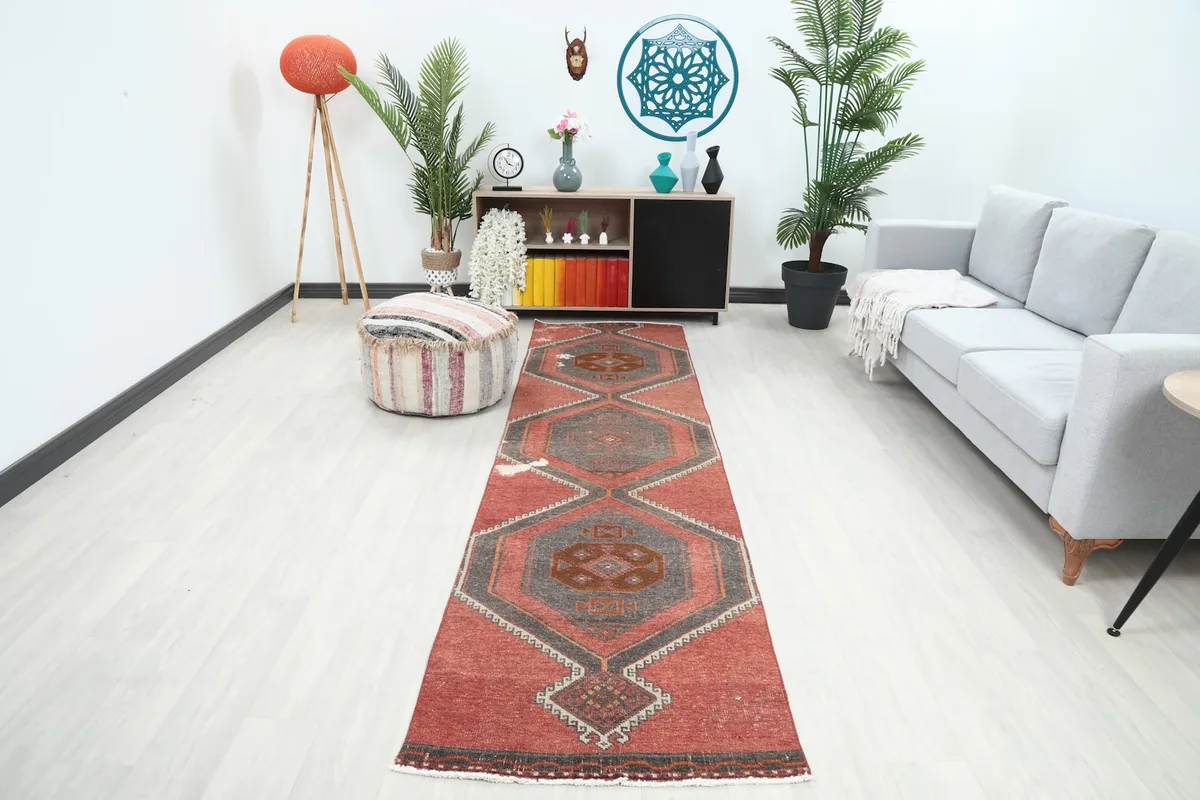 Long view of the rust and gray runner rug in a modern living space