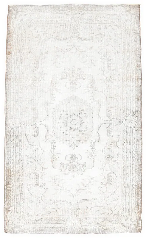 Full overhead view of the 4x7 vintage Anatolian rug with cream field and tan patterns