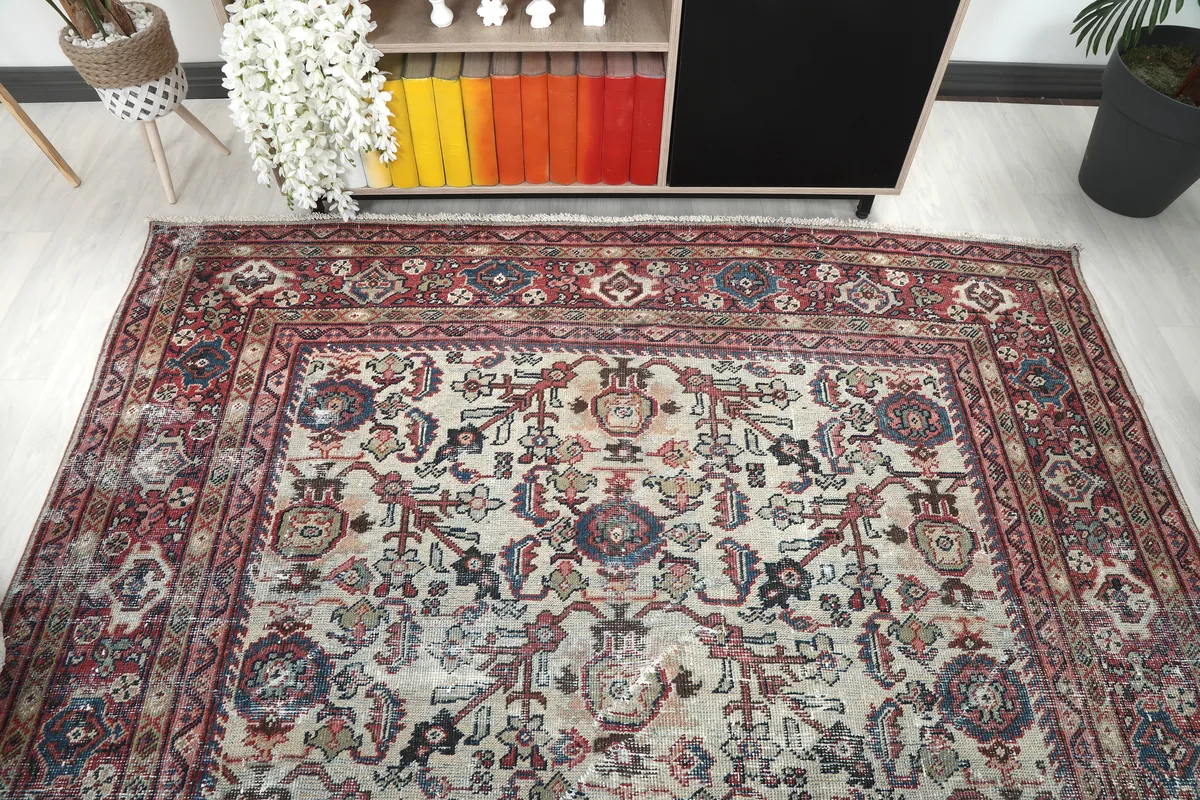Cream Rose Floral Anatolian Rug, slightly angled top view in a room setting