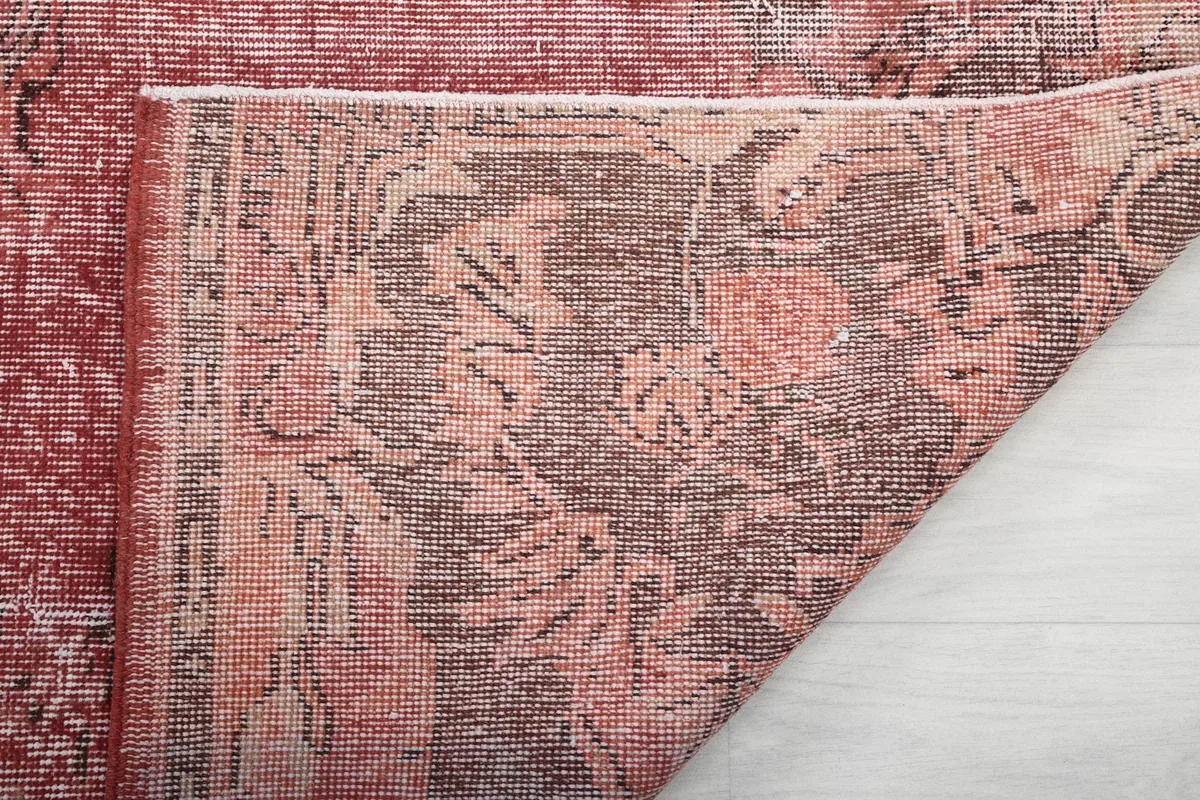Close-up of the hand-knotted cotton foundation and wool pile