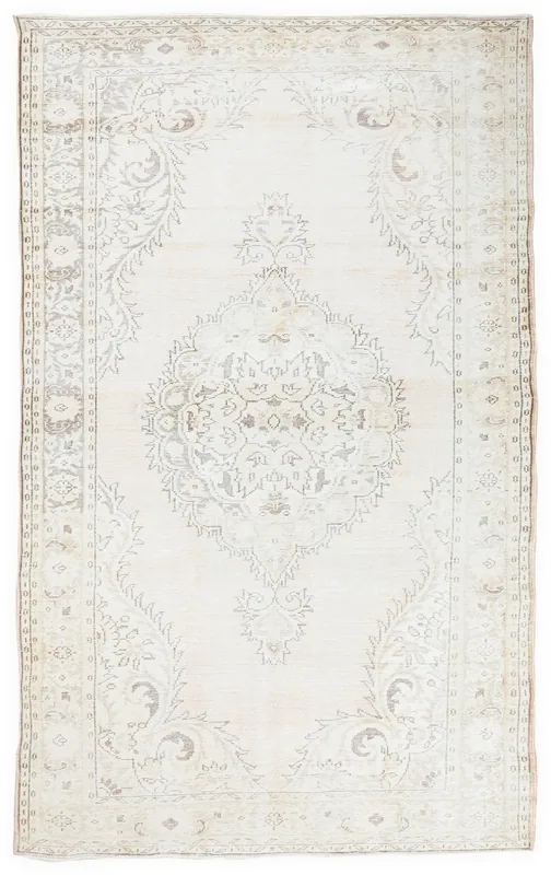 Full top view of the 6x10 vintage Anatolian rug with an ivory field and gray floral medallion