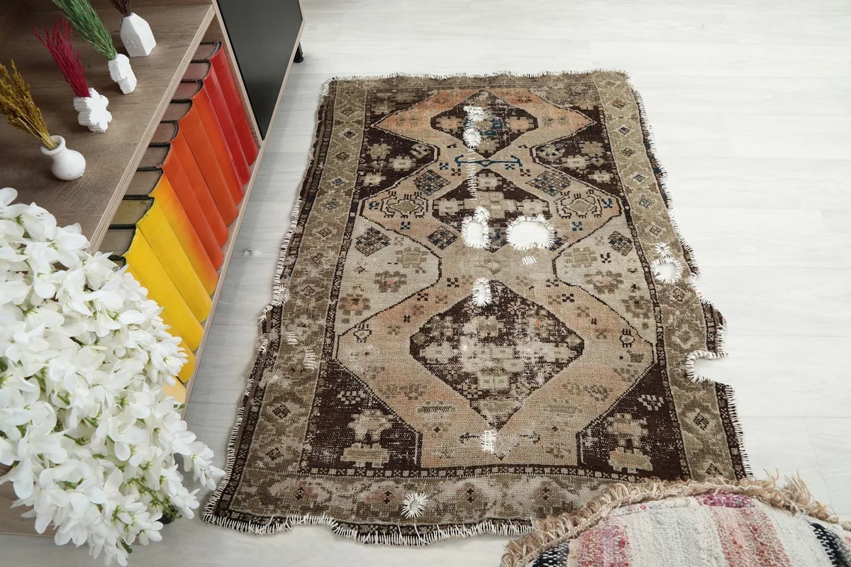 Wide angle view of the rug from the side, showcasing its shape and integration into the room decor.