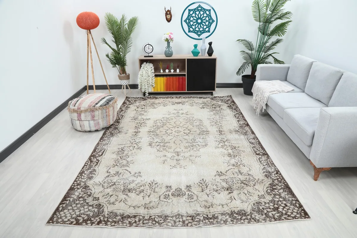 Vintage Anatolian rug displayed in a bright living room setting
