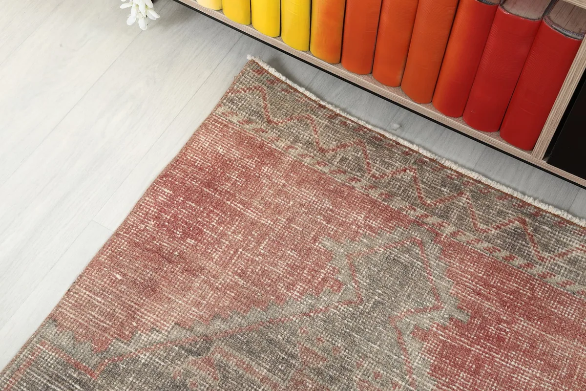 Angled top-down view of the runner rug, showing the border and field design