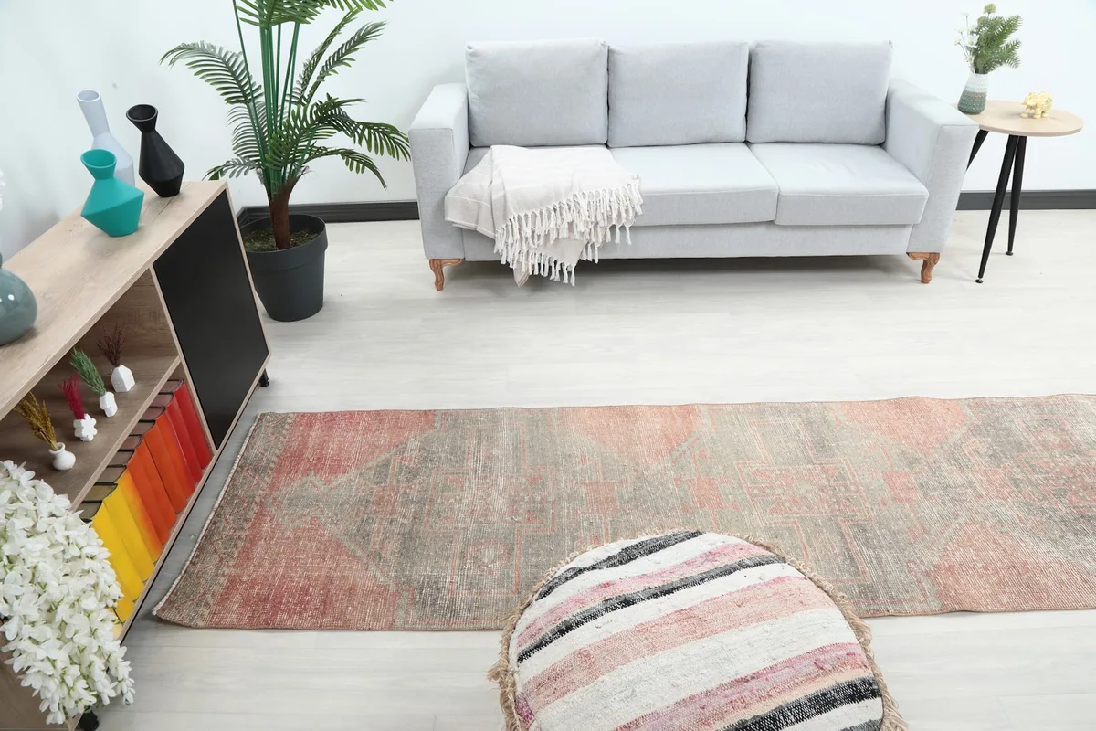 Runner rug in a room setting, viewed from a higher angle, showing its length and blend with decor