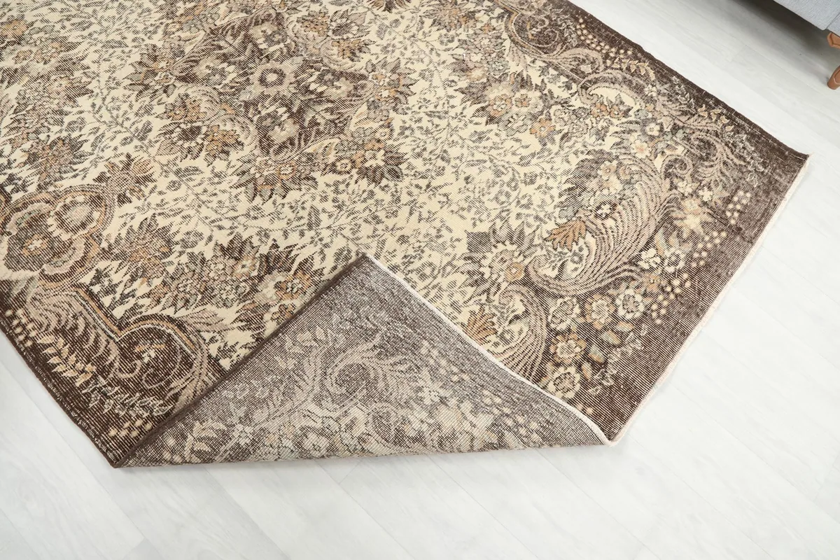 View of the rug's backside, showing the hand-knotted cotton foundation