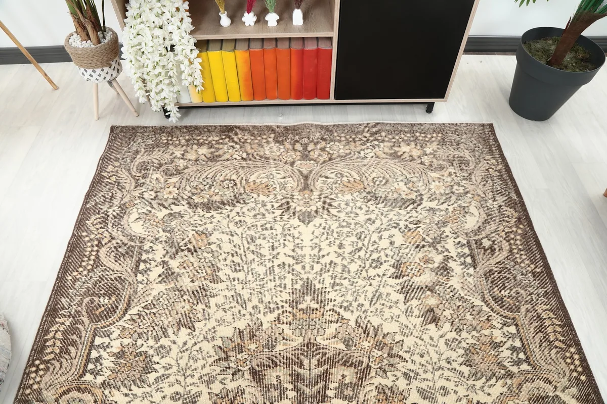 Overhead view showing the full pattern and shape of the vintage Anatolian rug