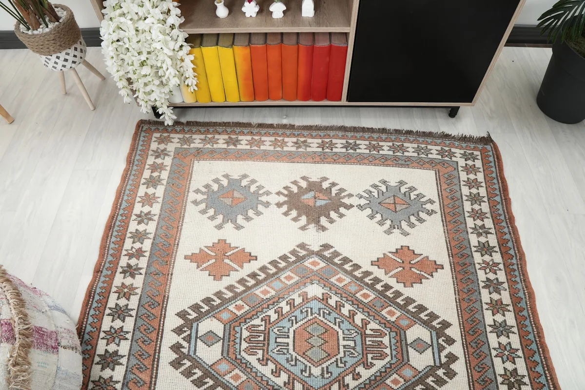 Overhead view of the rug's upper section, showing the full pattern repeat.