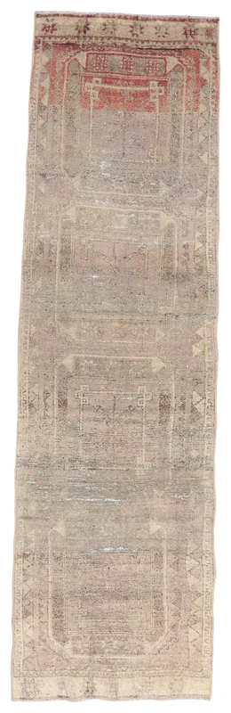 Full top view of the 2'4" x 9'0" gray and rust geometric runner rug on a white background.