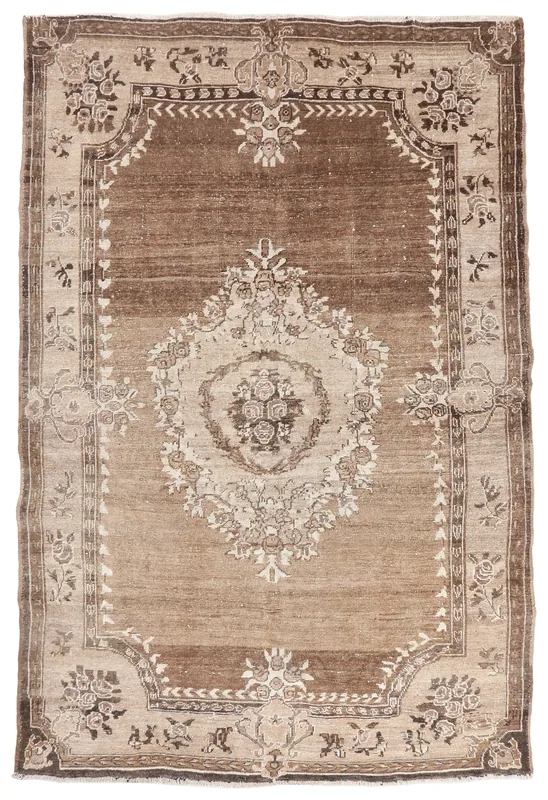 Full overhead view of the brown and beige vintage Anatolian rug