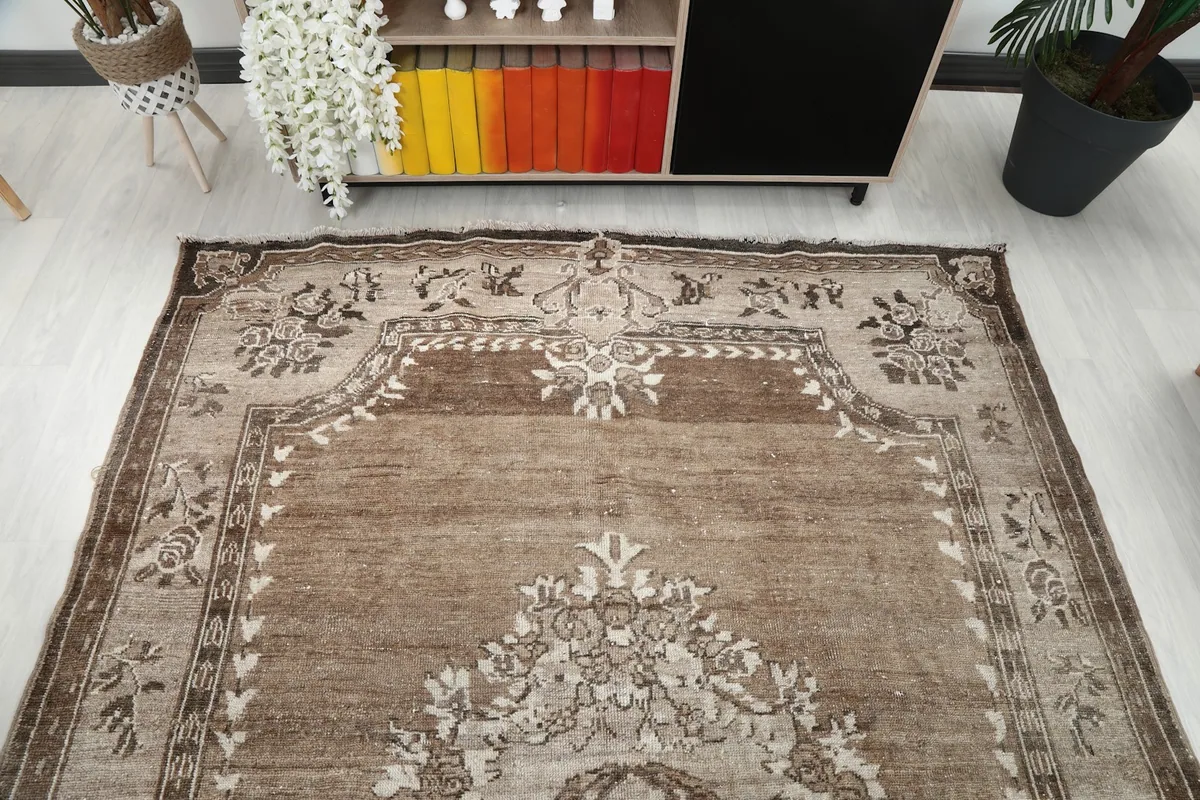 Overhead view of the upper half of the rug, showing the border and field patterns