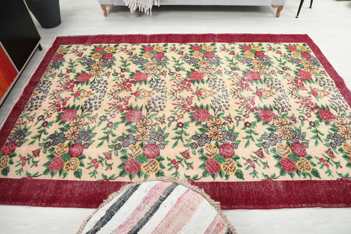 Full room view from a different angle, emphasizing the rug's central position and aesthetic impact.