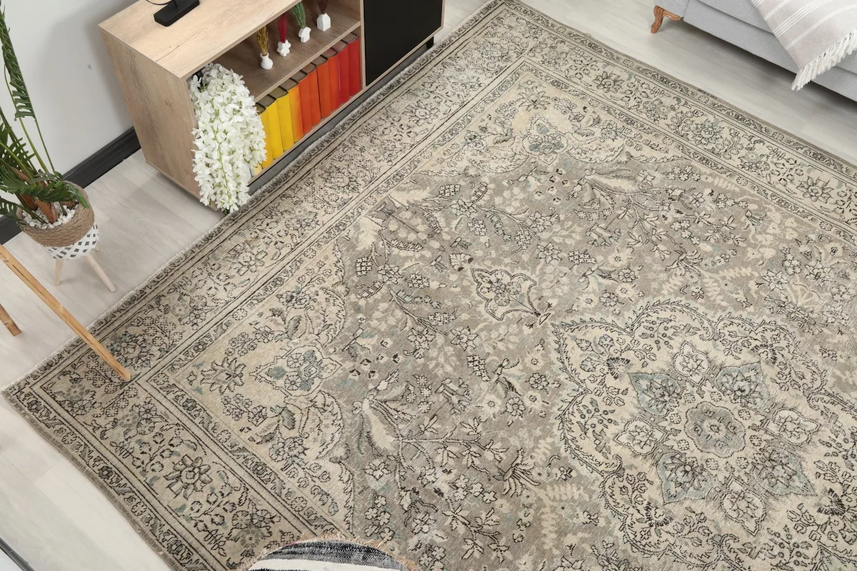 Another high angle shot of the oversized rug, capturing its decorative elements