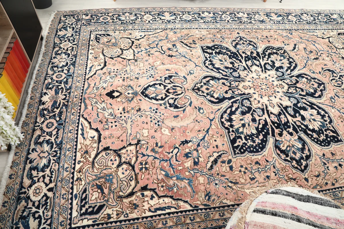 Rose Navy Floral Medallion Rug from a high angle, capturing the entire rug and its rich color palette.