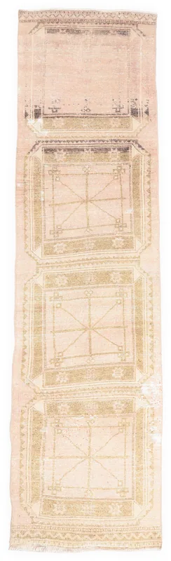 Full top view of the 2'11" x 11'3" pink and olive geometric vintage Anatolian runner on a white background.