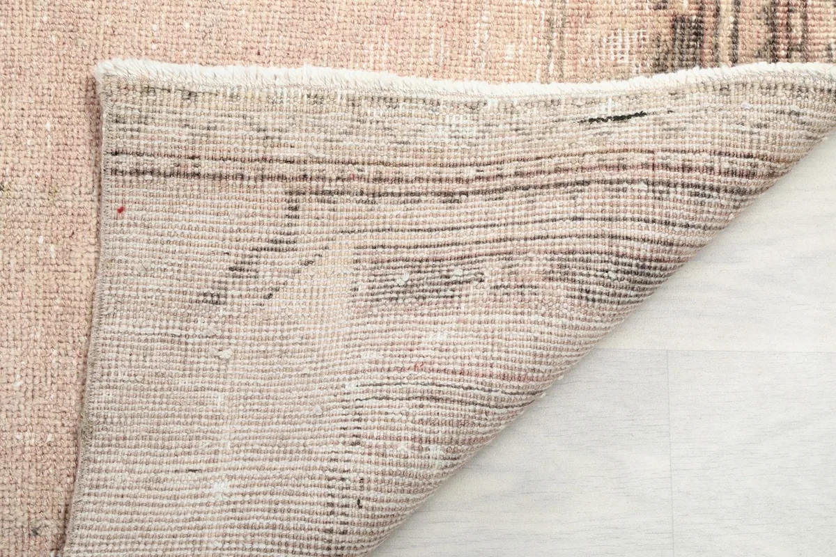 Close-up of the underside of the runner, demonstrating the tightly woven cotton foundation.