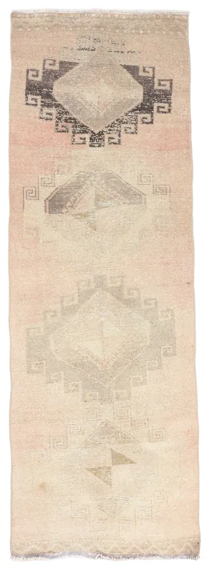 Full overhead view of the 2'10" x 9'1" vintage Anatolian runner on a white background, showcasing its geometric pattern.