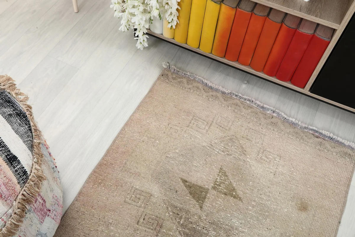 Overhead view of a section of the runner, showing its placement in a room with a colorful bookshelf.