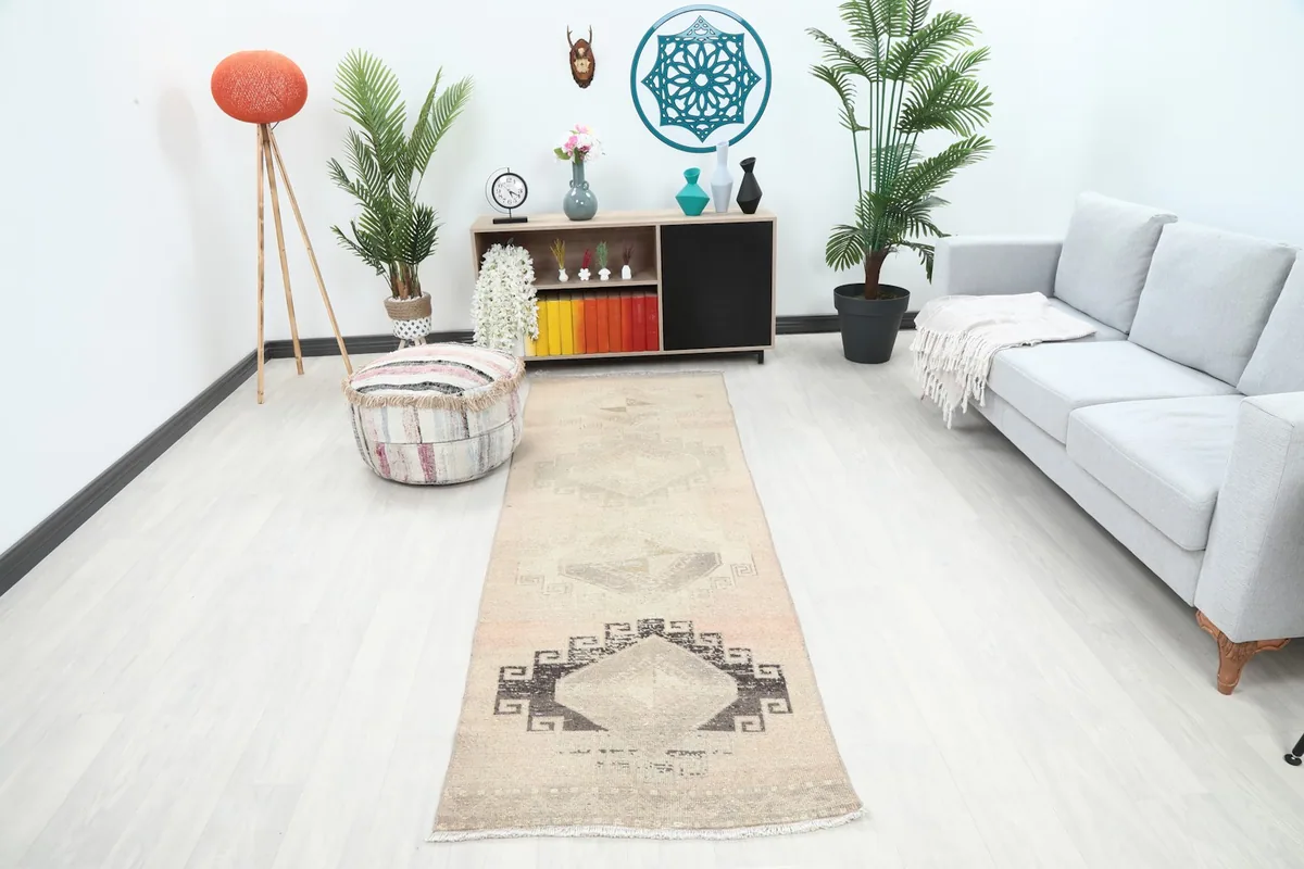 Runner rug displayed in a modern hallway setting, showing its length and how it complements light decor.