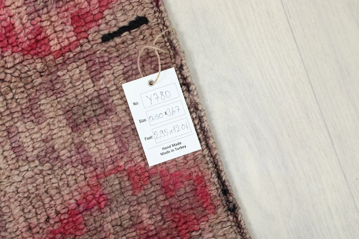 Rug tag displaying the dimensions 2'11" x 12'0" (90 x 367 cm) and origin from Turkey