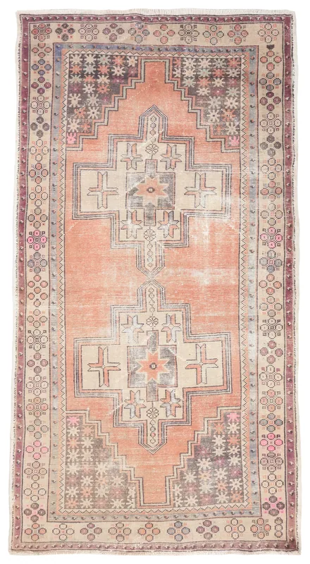 Full top view of the 4'4" x 8'2" orange and beige geometric Anatolian area rug on a white background.