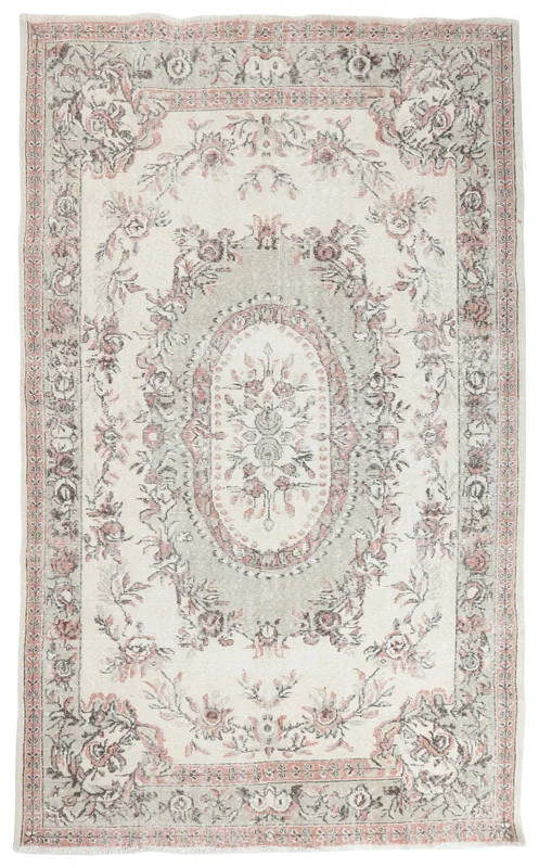 Full overhead view of the 6'2" x 10'2" ivory and rose Anatolian vintage rug