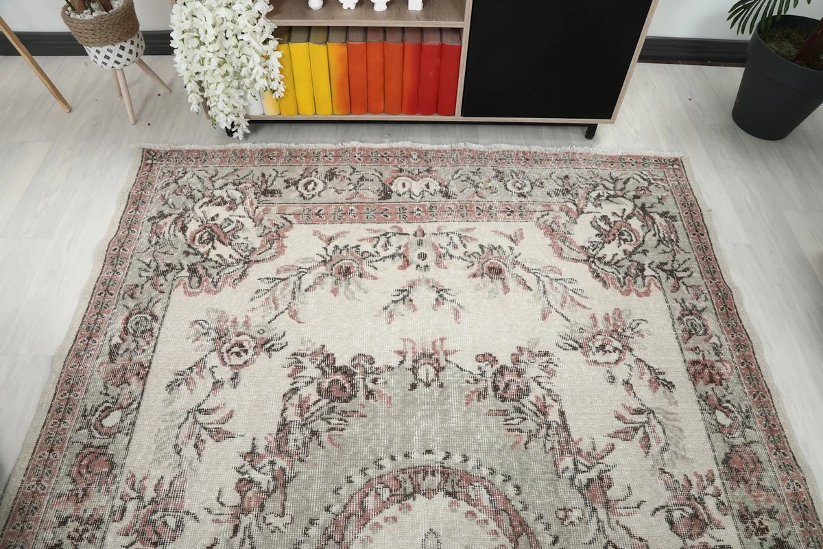 Overhead shot of the rug's top half, showing the medallion and surrounding elements